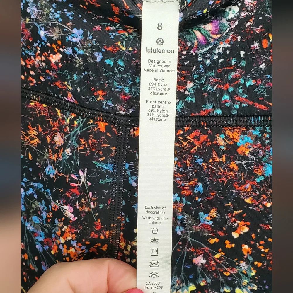 Lululemon Black Flower Athletic Crop Leggings. Size 8.